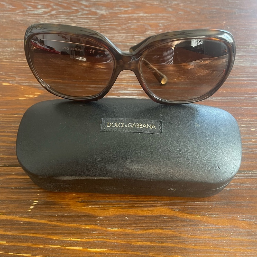 D&G glasses! Some scratches on the lens. Comes with hard case.